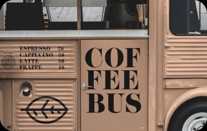 the entire drink menu of the mobile café in a QR code on the brown tin bus