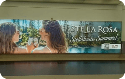 airport length billboard for stella rosa drinks with QR code