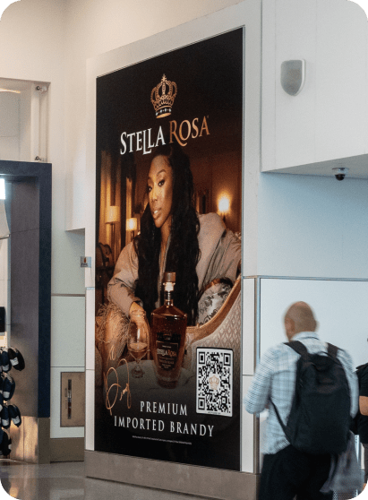 airport billboard advertising stella rosa and QR code